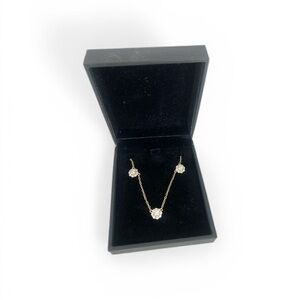 18” Elegant Gold over 925 sterling silver necklace with 5 stone flowers.